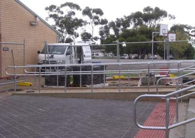 A handrail fabricated installed on a staircase in a public area